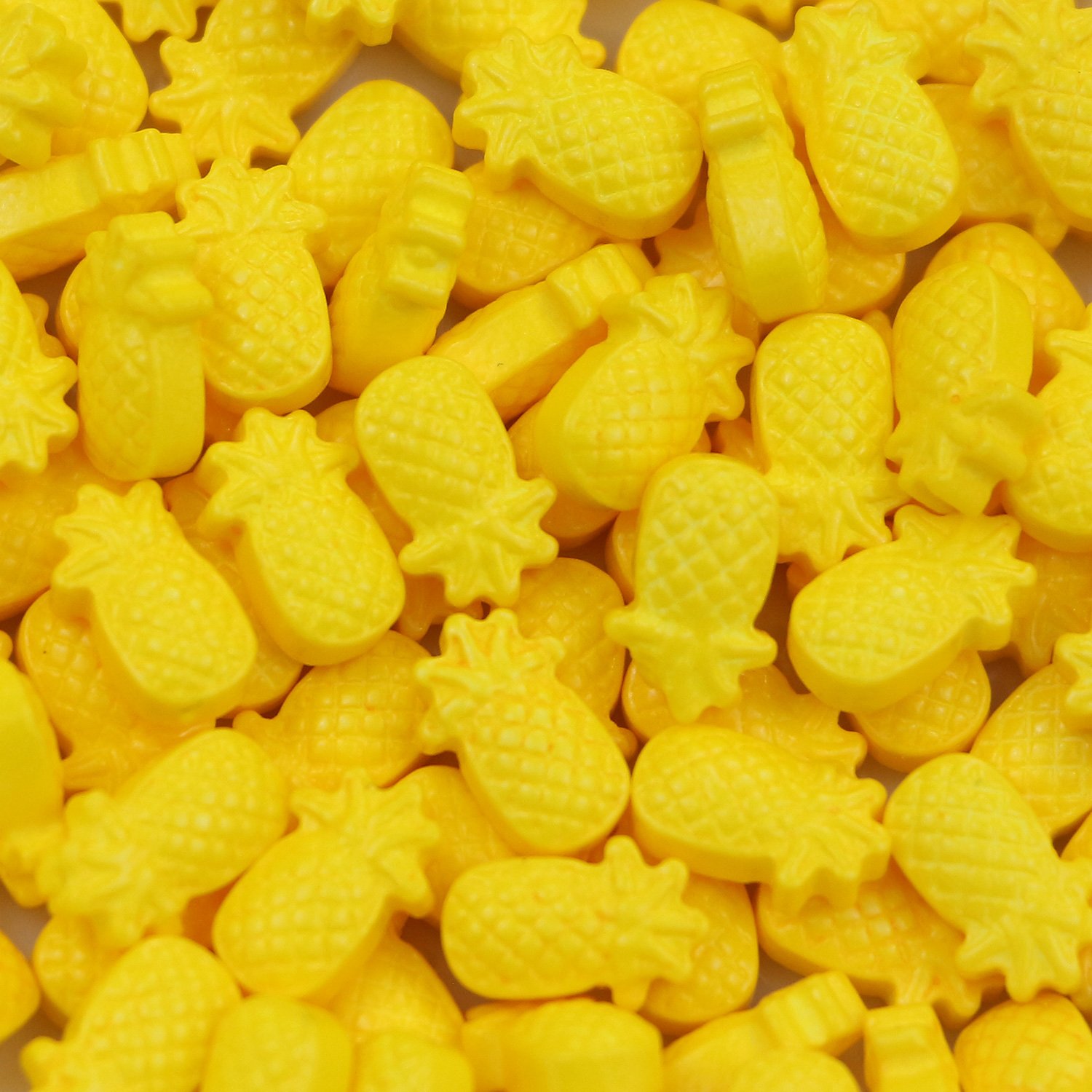 Yellow pineapple-shaped press candy with cross-hatch texture for fruity and sour confectionery lines