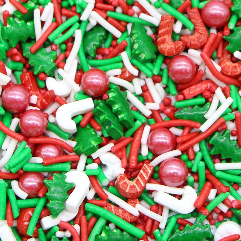 Christmas magic sprinkle mix with holly leaves, candy canes, snowflakes, gold pearls and red and green nonpareils