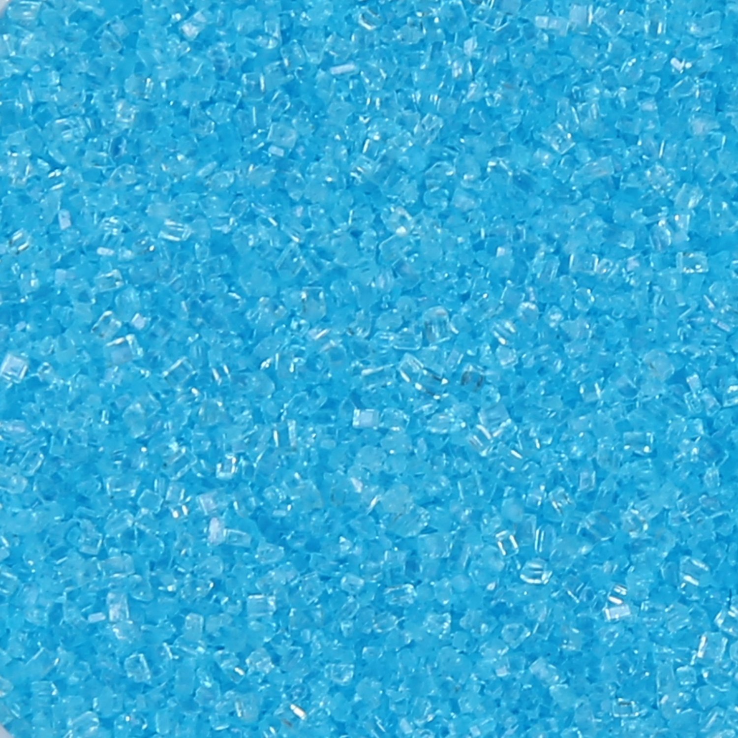 Fine blue sanding sugar crystals showing uniform small grain size