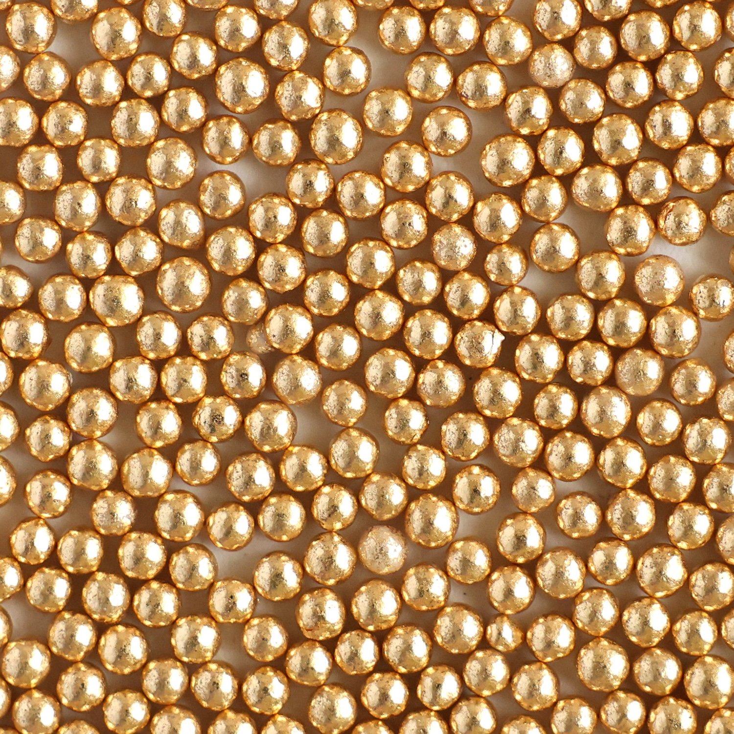 Gold metallic sugar pearls in bulk with a reflective metallic finish