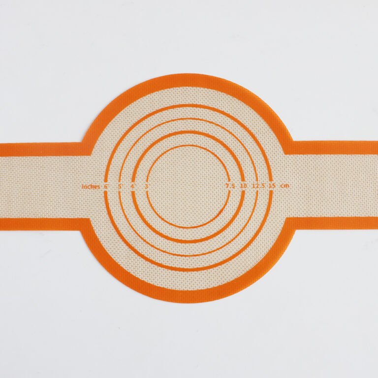 Silicone baking mat with orange measuring circles in inches and centimetres