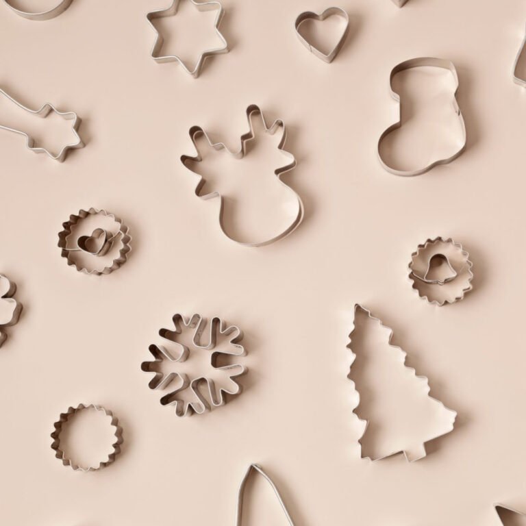 Stainless steel cookie cutters shaped as stars, reindeer, trees and snowflakes