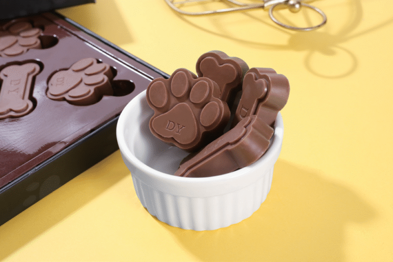 Custom-moulded milk chocolate paw and bone shapes with a branded mould