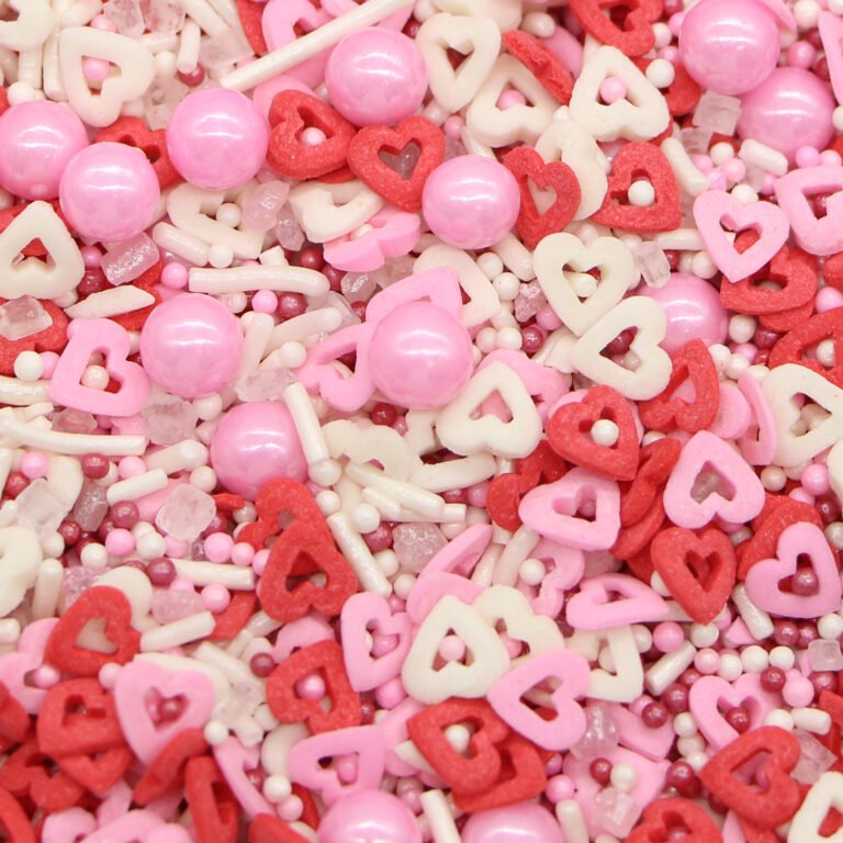 Romantic Valentine's sprinkle mix with red, pink and white heart shapes, pink pearls and rods