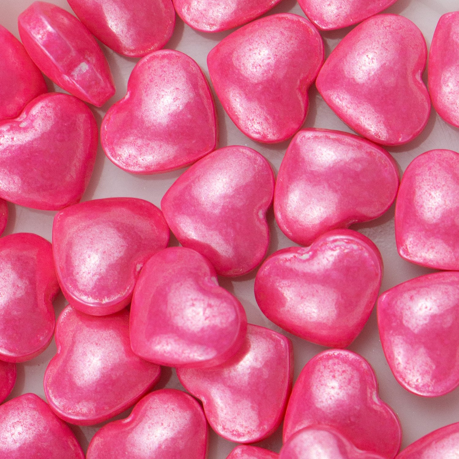 Pink pearlescent heart-shaped press candy for wedding cakes and Valentine's Day confectionery