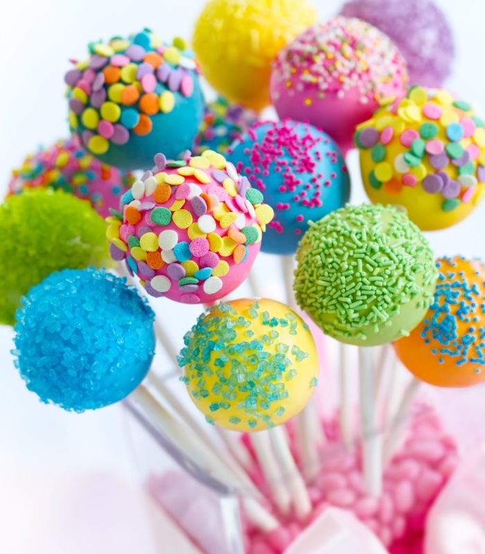 Assortment of brightly colored cake pops